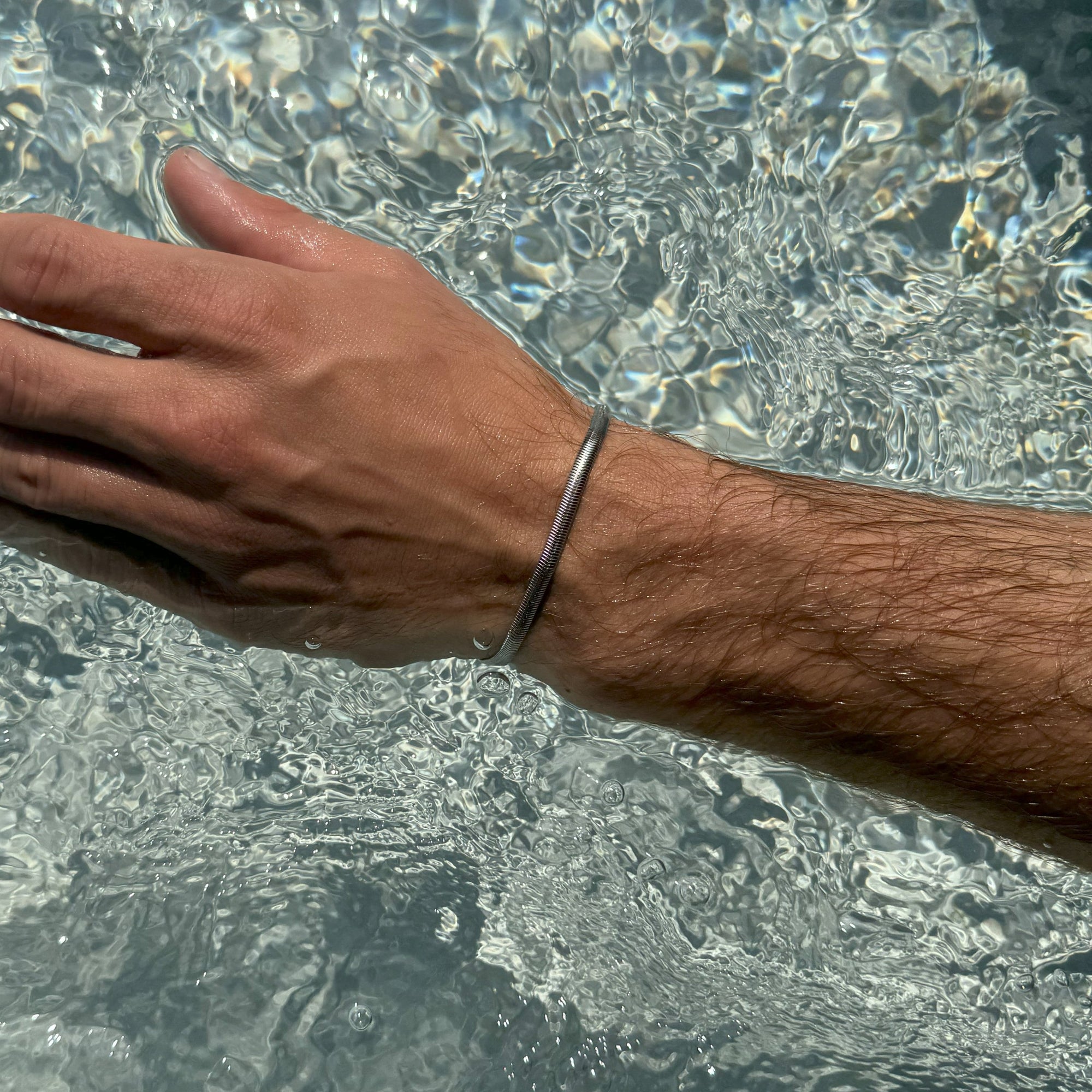 Silver Emblem Bracelet