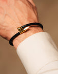 Needle bracelet (black with gold)