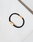 Needle bracelet (black with gold)